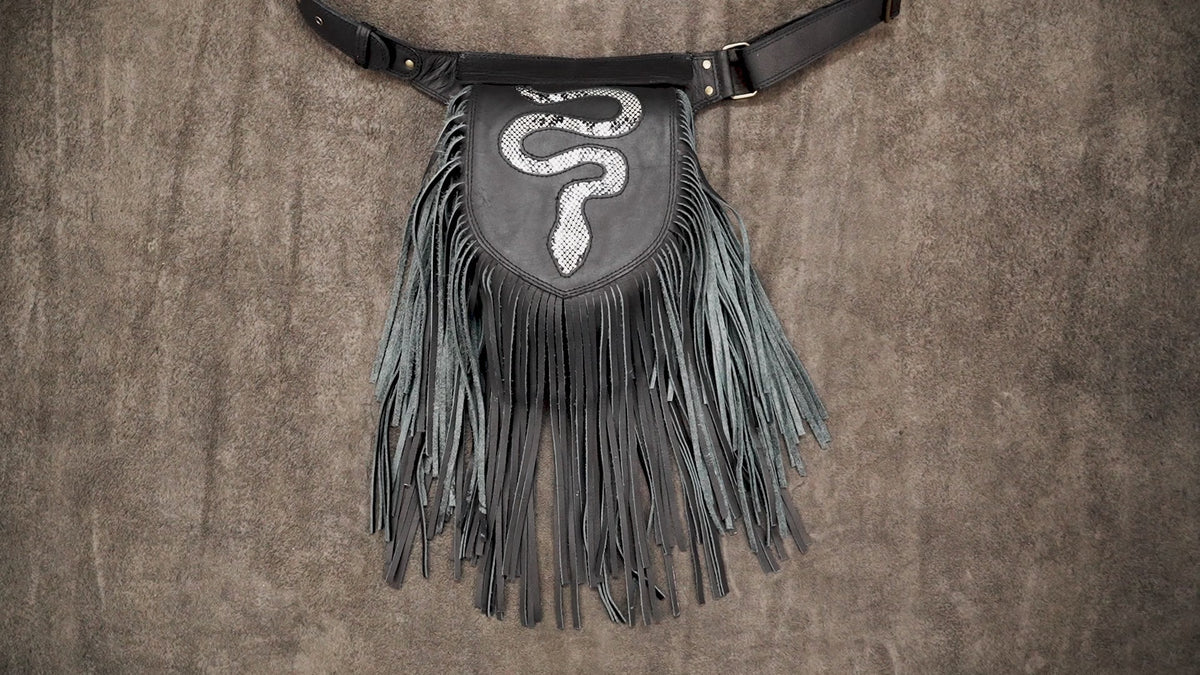 Handmade leather fanny pack with fringe snake design and waist belt