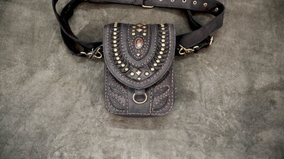 Handcrafted black leather festival utility belt bag with antique brass hardware.   