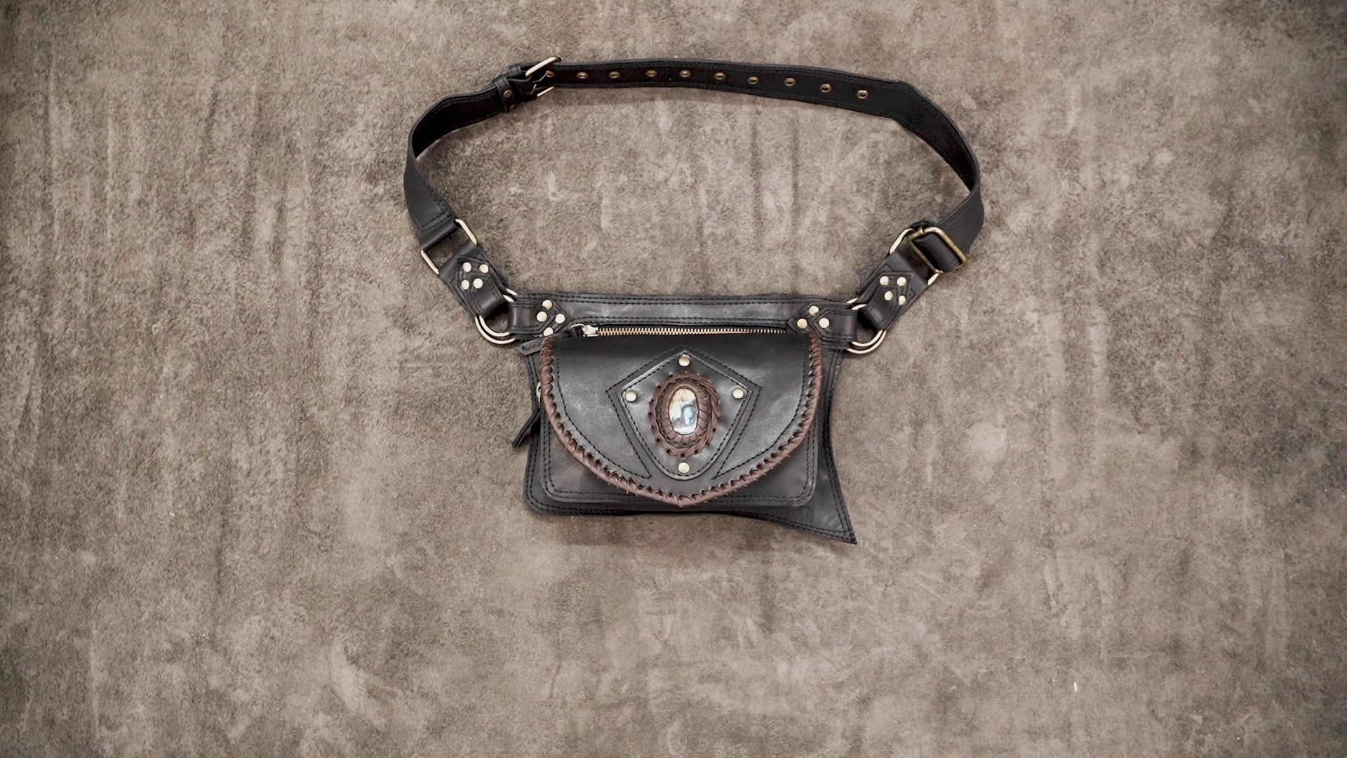 Black leather utility holster bag with crystal gemstone and metal rings