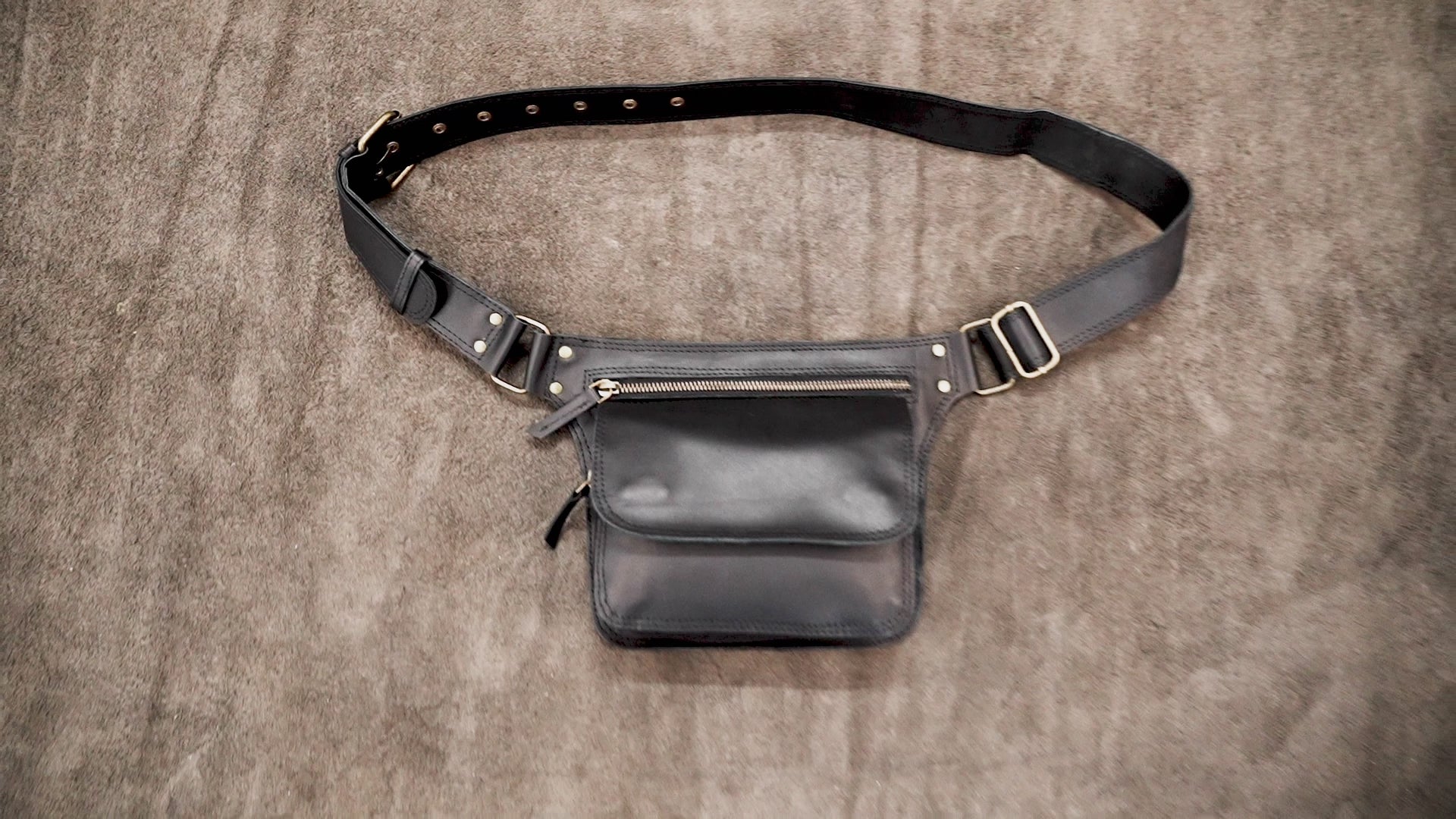 Handcrafted leather hip pouch with zippered front pocket