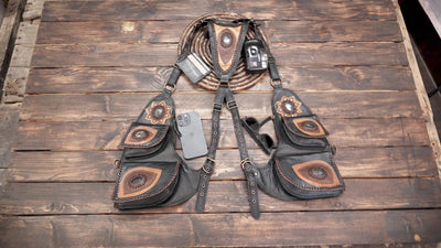 Unisex black leather festival harness with decorative stone pocket flaps