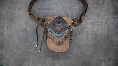 Boho leather hip bag with gemstone accent and decorative stitching