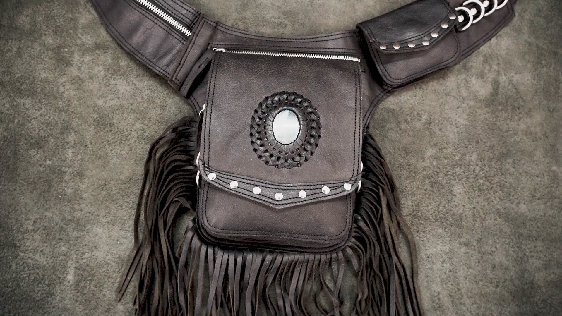 Adjustable leather festival belt bag with multiple zipper pockets