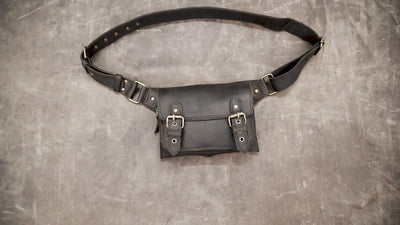 Handcrafted leather waist accessory with brass hardware
