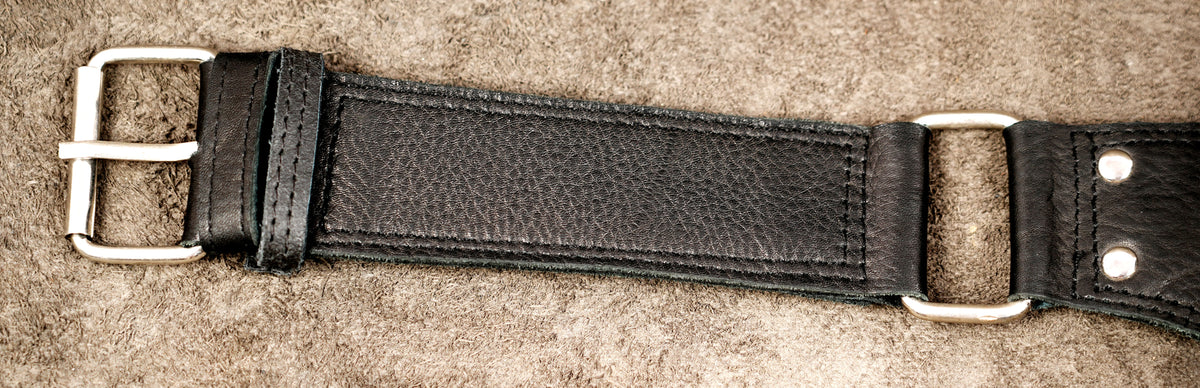 Genuine leather waist bag styled on suede background