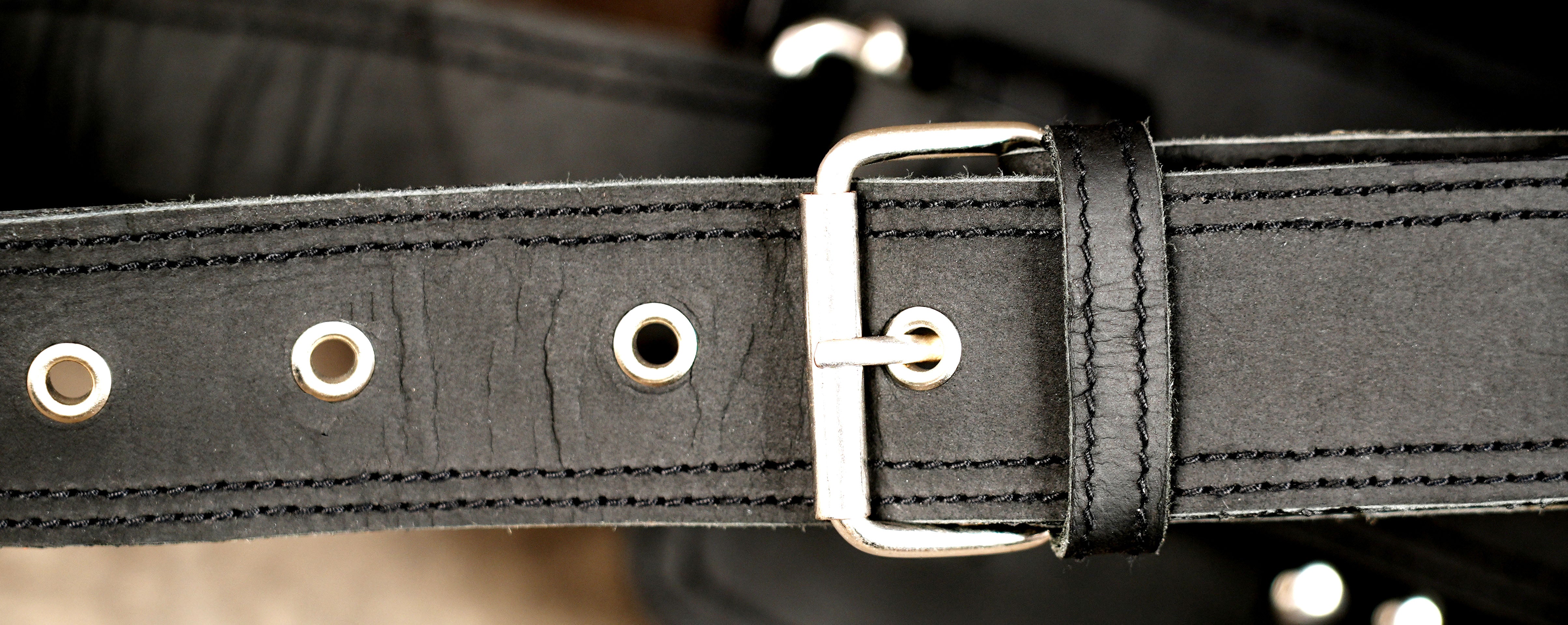 Genuine leather waist bag styled on stone background
